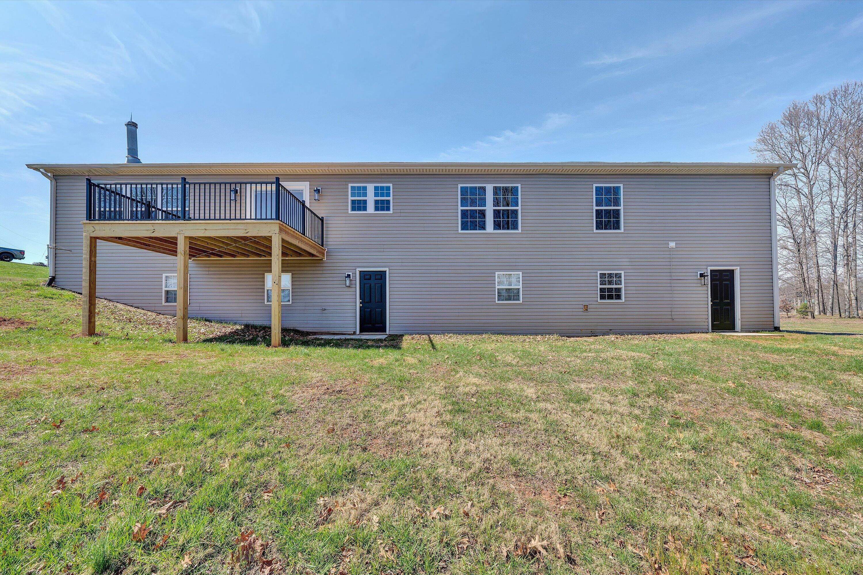 200 Surber Drive Moneta, VA 24121 - Photo 44 of 52 front view of a house with a big yard