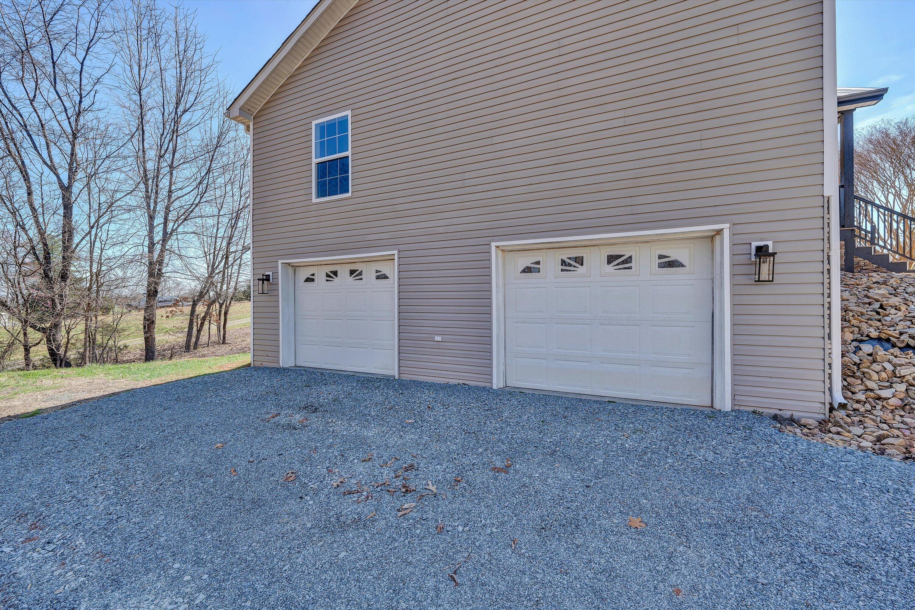 200 Surber Drive Moneta, VA 24121 - Photo 46 of 52 a view of a house with a garage