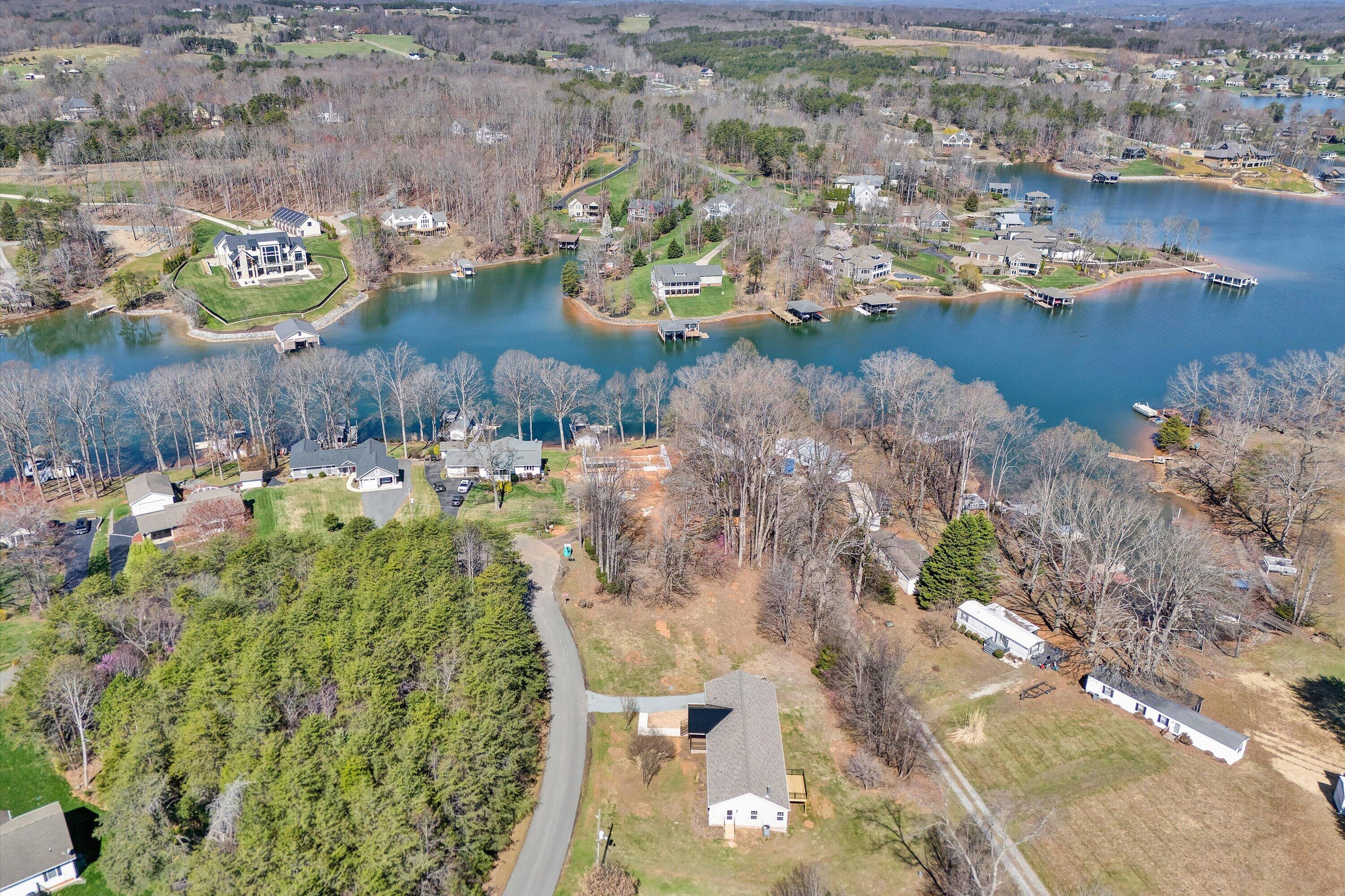 200 Surber Drive Moneta, VA 24121 - Photo 48 of 52 an aerial view of a house with a yard and lake view