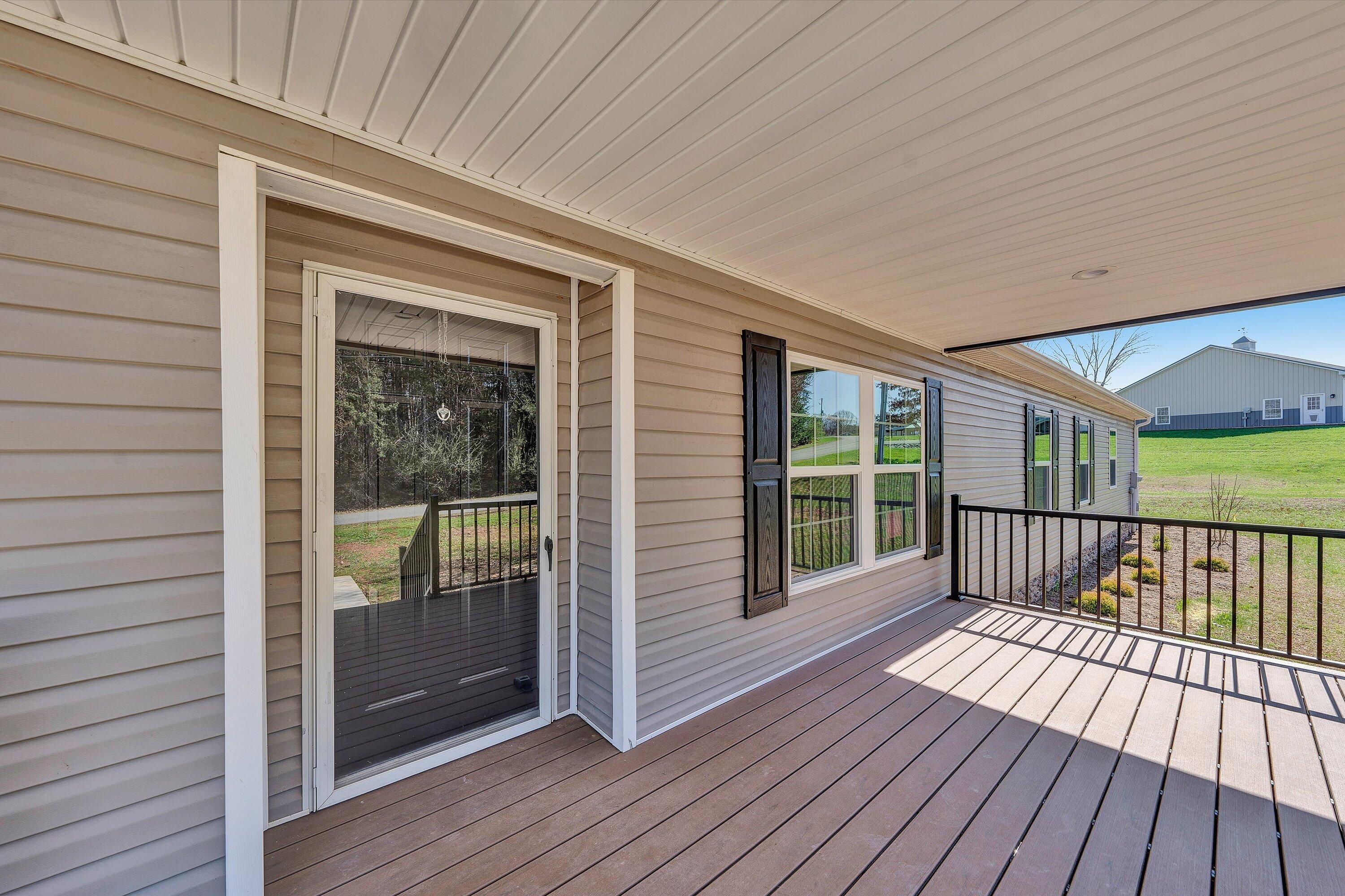 200 Surber Drive Moneta, VA 24121 - Photo 7 of 52 a view of balcony with wooden floor