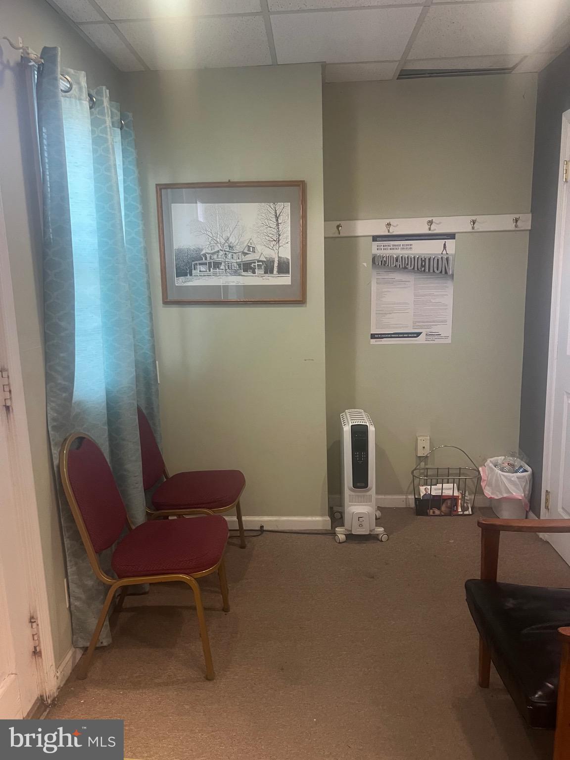 648 East Chester Pike, Unit A Ridley Park, PA 19078 - Photo 9 of 10 a room with furniture and a window