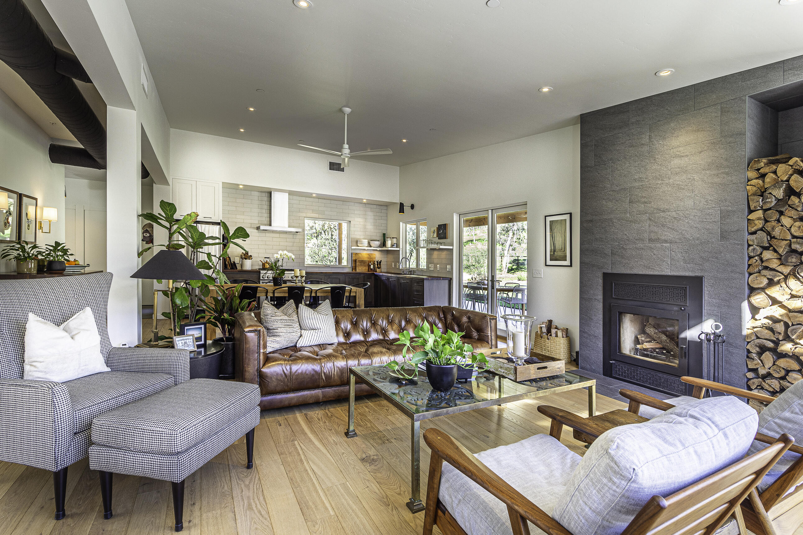 44102 Dinely Drive Three Rivers, CA 93271 - Photo 1 of 35 a living room with furniture potted plant and a fireplace
