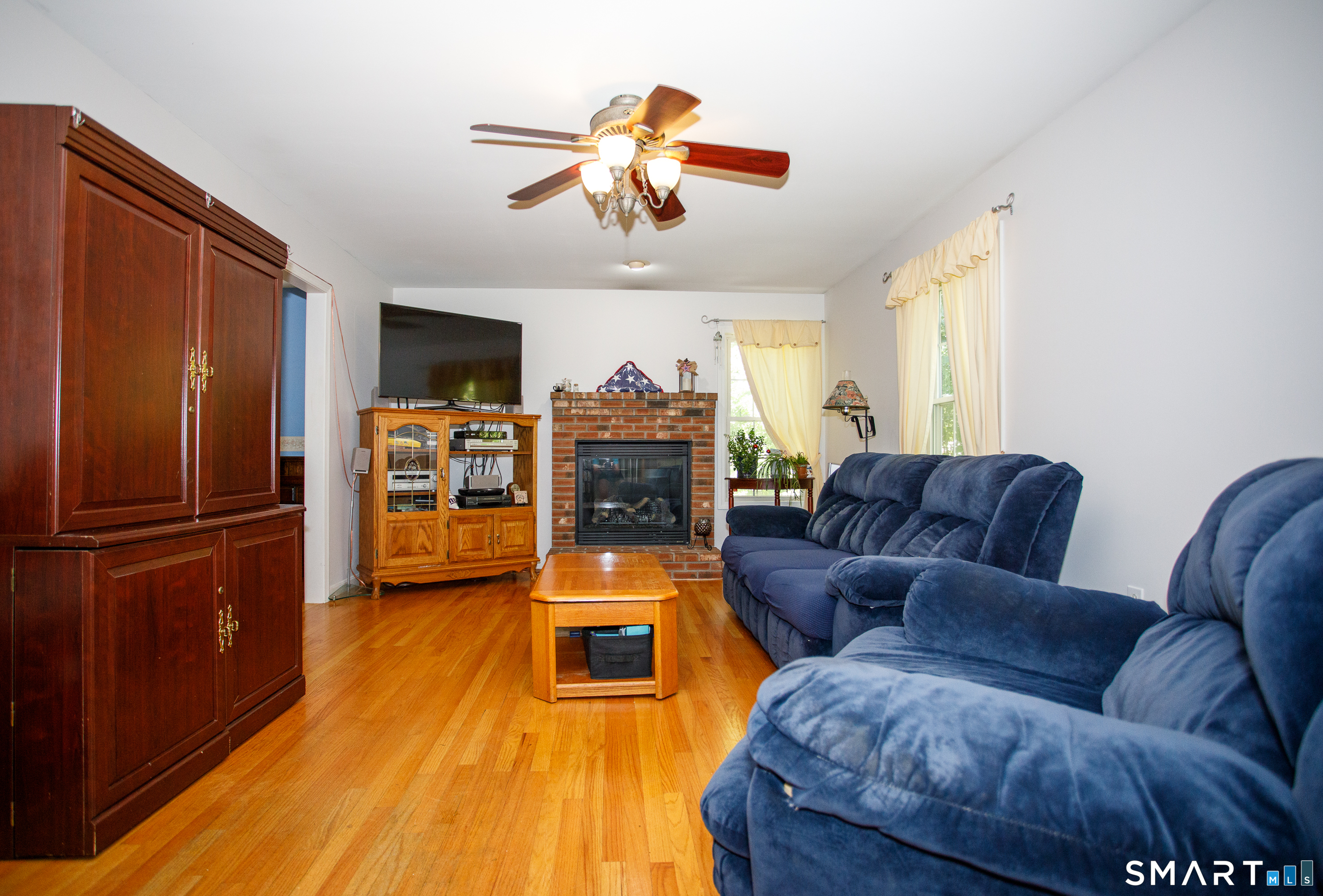 264 North Wawecus Hill Road Norwich, CT 06360 - Photo 13 of 29 GAS FIREPLACED FAMILY ROOM