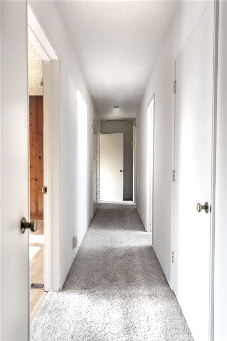 5211 Ocean View Boulevard La Canada Flintridge, CA 91011 - Photo 12 of 45 a view of a hallway with wooden floor
