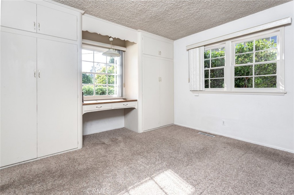 5211 Ocean View Boulevard La Canada Flintridge, CA 91011 - Photo 17 of 45 an empty room with a window