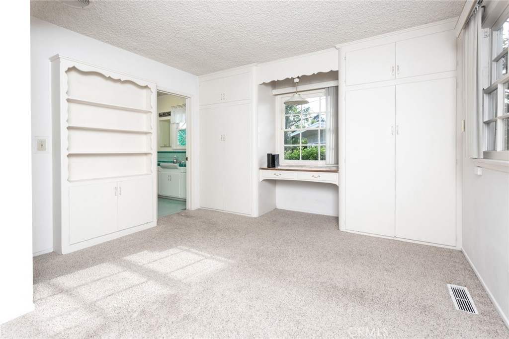 5211 Ocean View Boulevard La Canada Flintridge, CA 91011 - Photo 18 of 45 an empty room with windows and closet