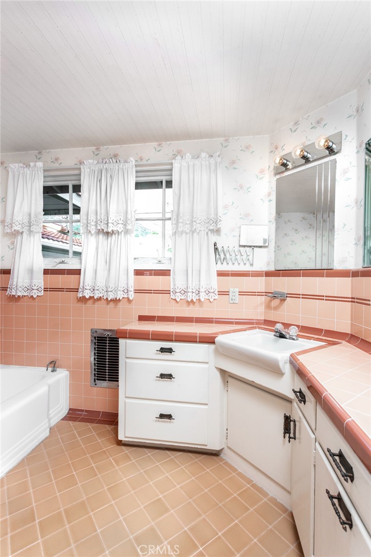5211 Ocean View Boulevard La Canada Flintridge, CA 91011 - Photo 24 of 45 a kitchen with a sink cabinets and window