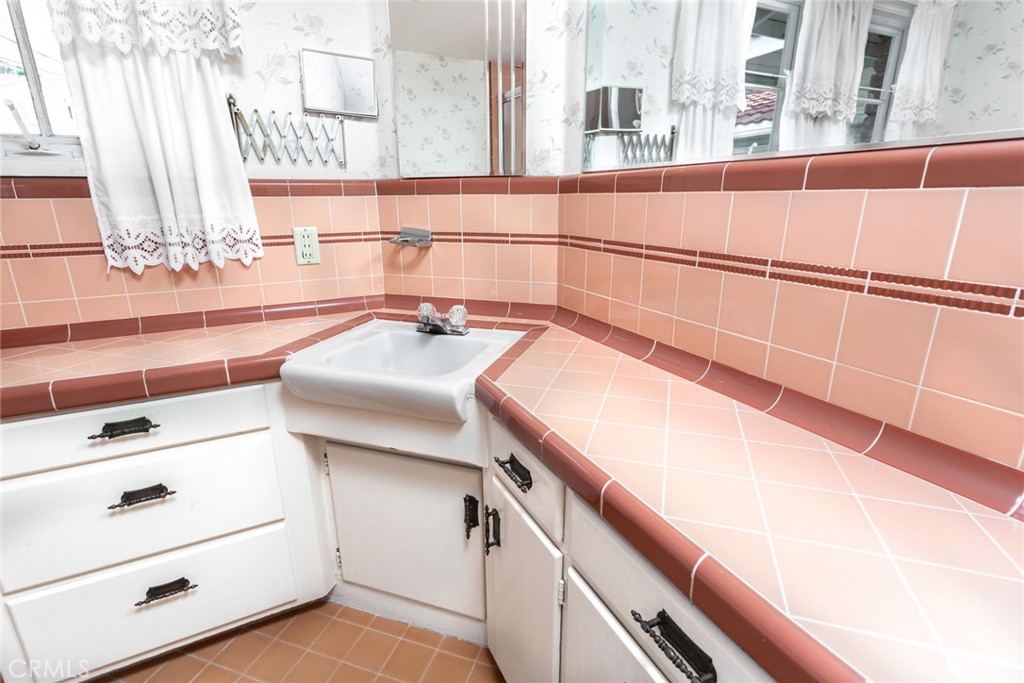 5211 Ocean View Boulevard La Canada Flintridge, CA 91011 - Photo 25 of 45 a view of a kitchen with furniture and a window
