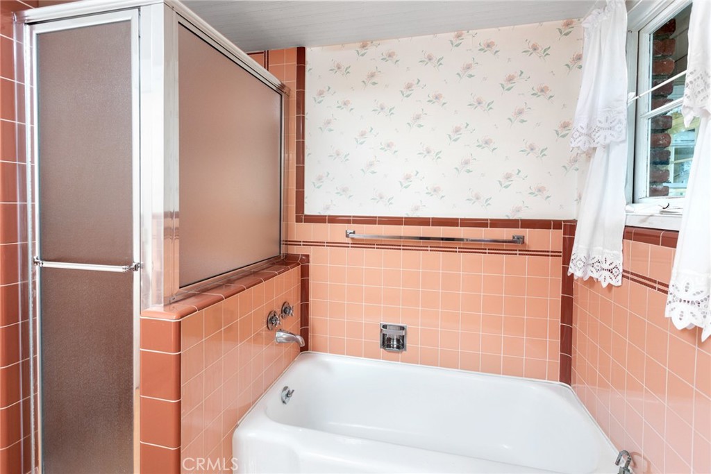5211 Ocean View Boulevard La Canada Flintridge, CA 91011 - Photo 26 of 45 a bathroom with a bathtub and shower