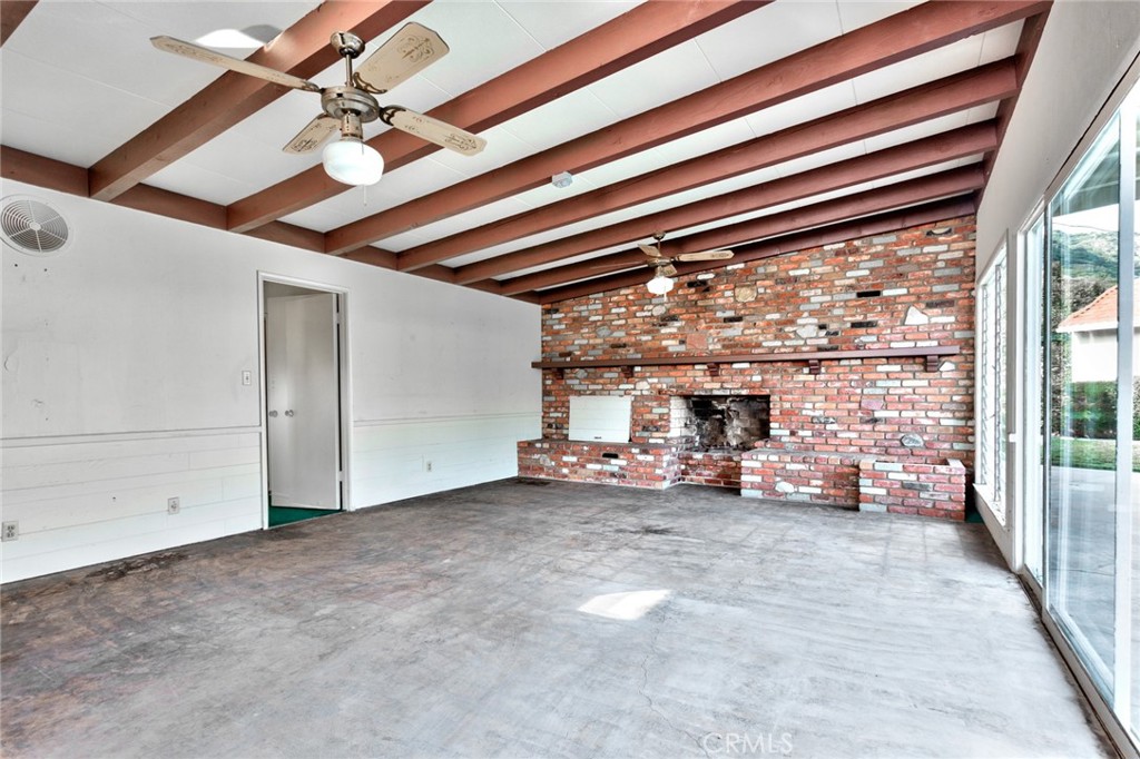 5211 Ocean View Boulevard La Canada Flintridge, CA 91011 - Photo 30 of 45 a view of a room with gym equipment and a large window
