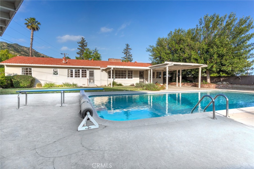 5211 Ocean View Boulevard La Canada Flintridge, CA 91011 - Photo 38 of 45 a view of a house with a yard and sitting area