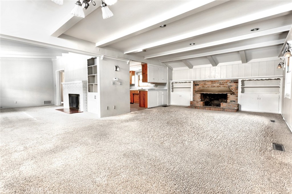 5211 Ocean View Boulevard La Canada Flintridge, CA 91011 - Photo 7 of 45 a view of a livingroom with a fireplace