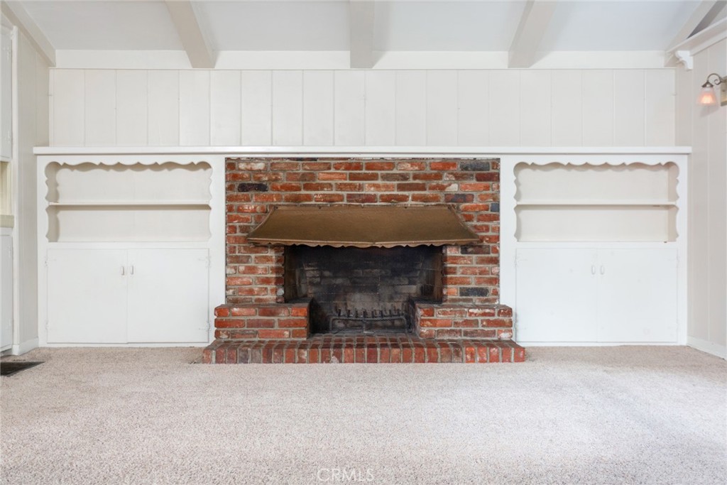 5211 Ocean View Boulevard La Canada Flintridge, CA 91011 - Photo 8 of 45 a living room with a fireplace