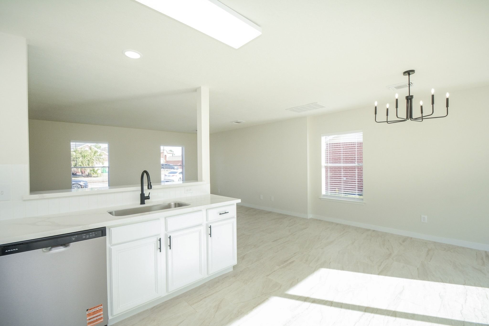 4903 South Lazy Ridge Drive Houston, TX 77053 - Photo 11 of 29 a kitchen with a sink cabinets and window