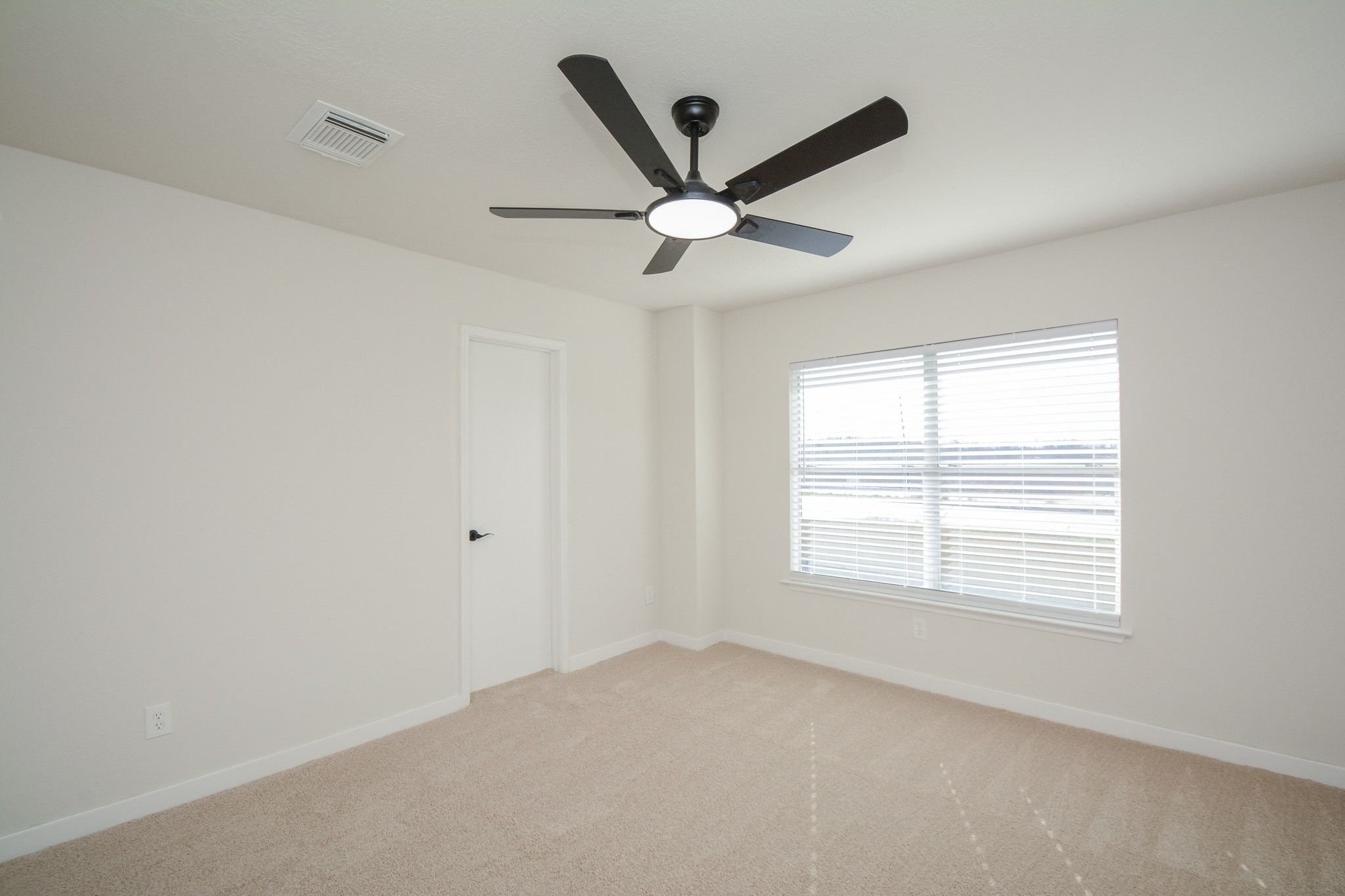 4903 South Lazy Ridge Drive Houston, TX 77053 - Photo 15 of 29 a view of an empty room with a window