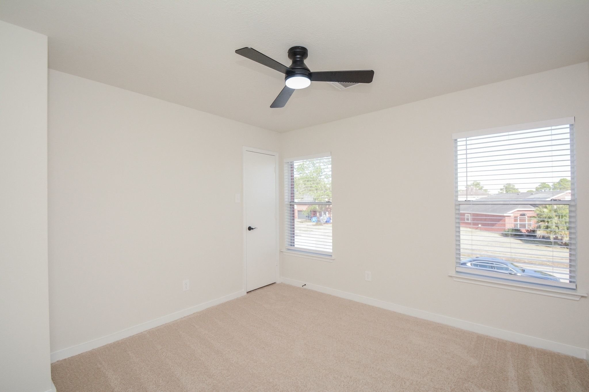4903 South Lazy Ridge Drive Houston, TX 77053 - Photo 19 of 29 a view of empty room with windows
