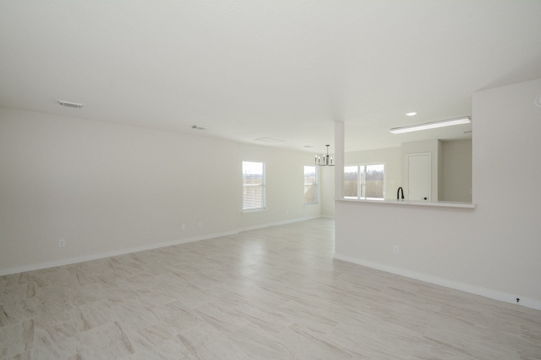 4903 South Lazy Ridge Drive Houston, TX 77053 - Photo 3 of 29 a view of empty room with wooden floor