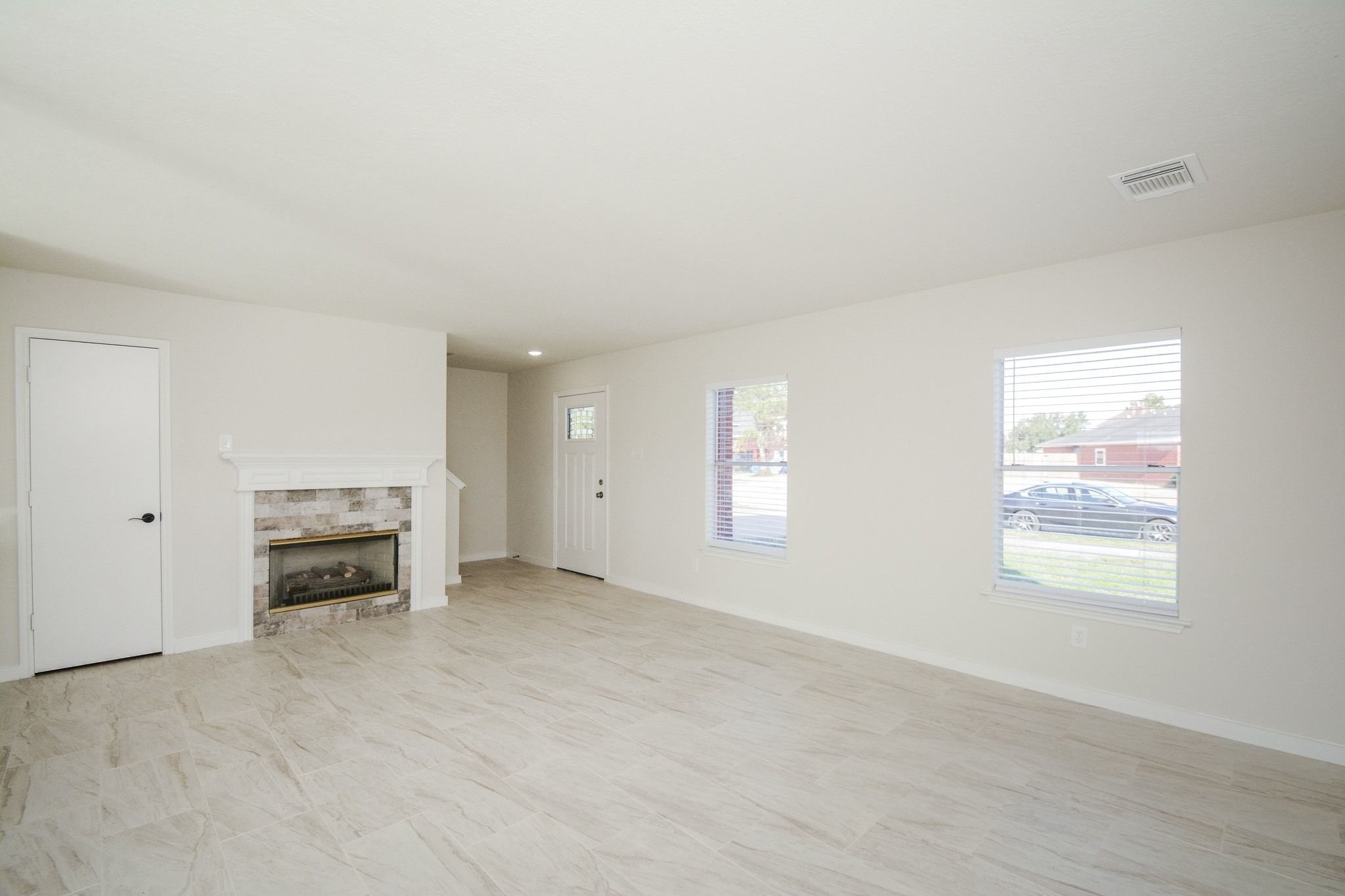4903 South Lazy Ridge Drive Houston, TX 77053 - Photo 4 of 29 a view of an empty room with a window