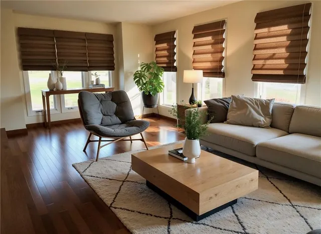 a kitchen with stainless steel appliances granite countertop a sink a stove a refrigerator cabinets and dining table