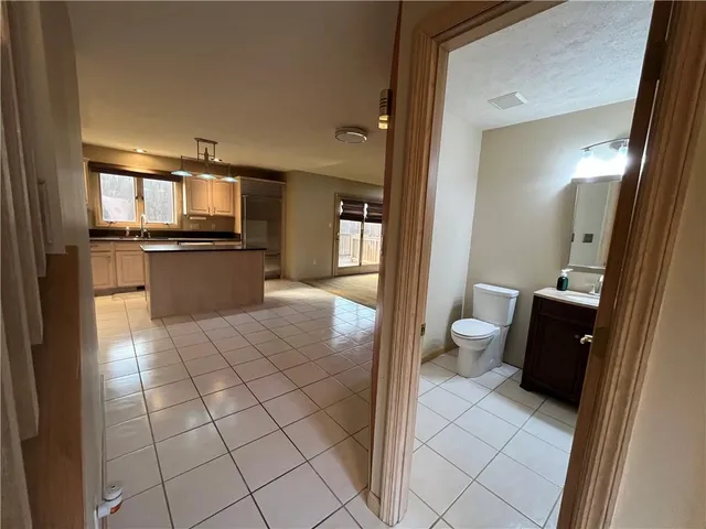 a view of a room with large windows