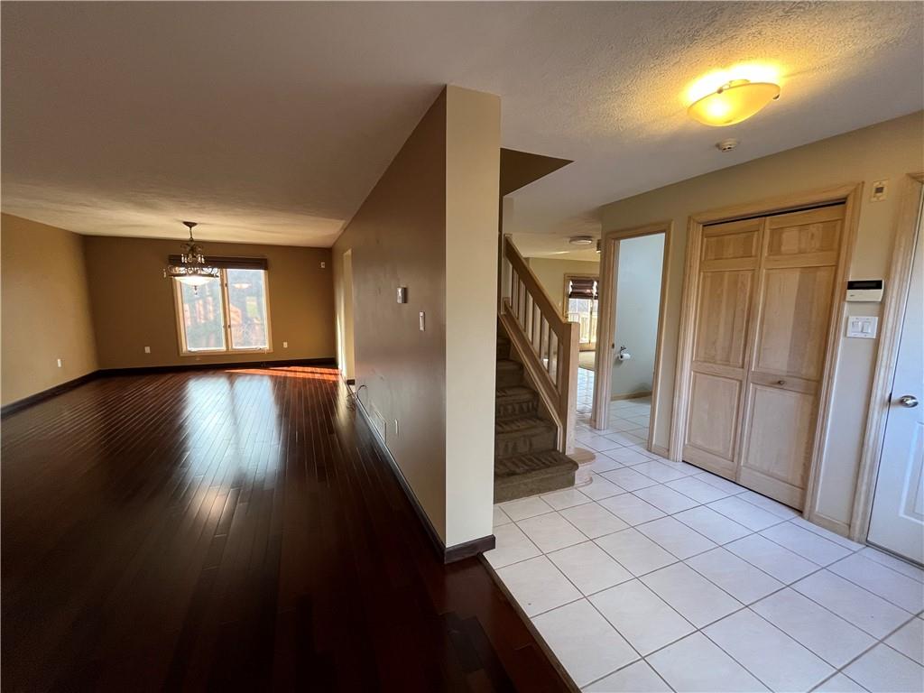 506 Princess Drive Elizabeth, PA 15037 - Photo 7 of 46 a view of entryway with wooden floor