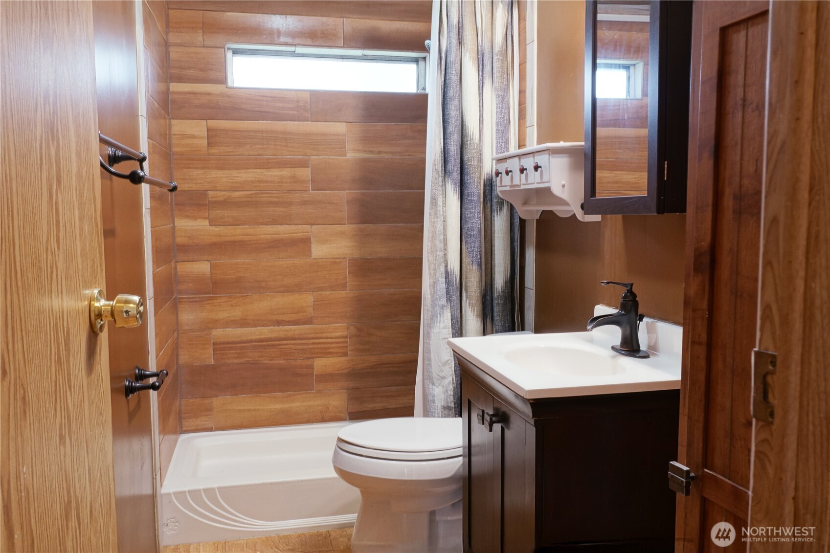 510 Duterrow Road Southeast, Unit 22 Lacey, WA 98513 - Photo 16 of 27 a bathroom with a sink toilet and shower