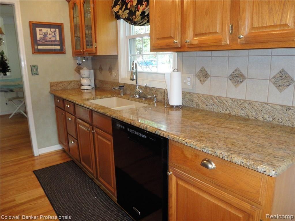 1796 East Maple Road Birmingham, MI 48009 - Photo 8 of 27 Updated Kitchen with Granite Counters