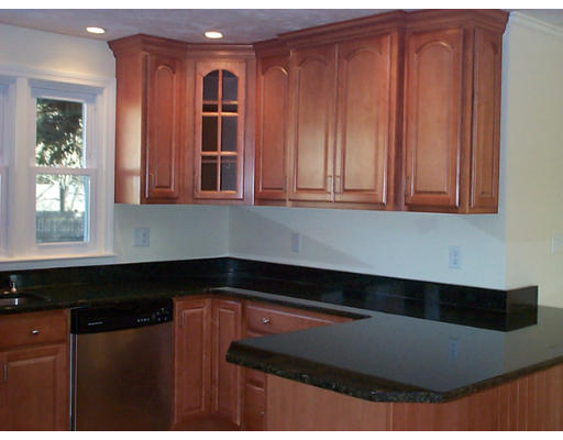 9 Bellevue Road Andover, MA 01810 - Photo 3 of 12 a kitchen with a sink and cabinets