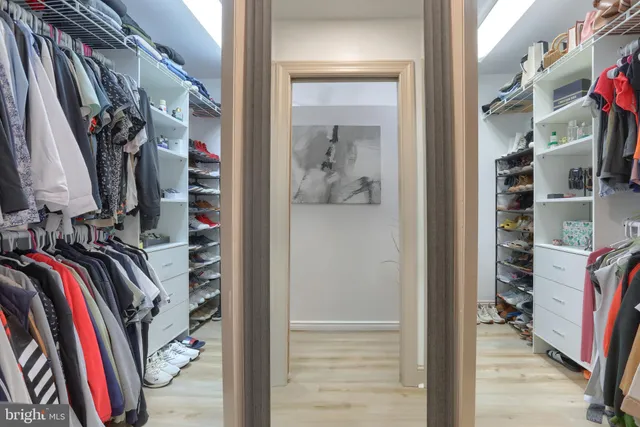 a bathroom with a sink double vanity and a toilet