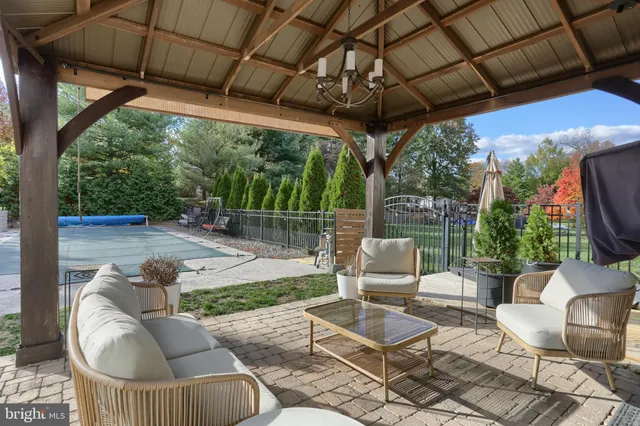 a outdoor living space with furniture and garden view