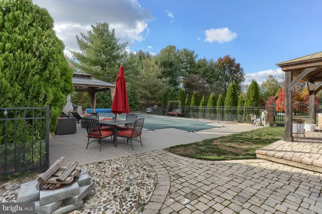 a view of a house with sitting area and furniture