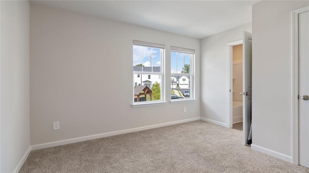 1629 Flint River Place Southeast Smyrna, GA 30126 - Photo 13 of 27 a view of an empty room with window