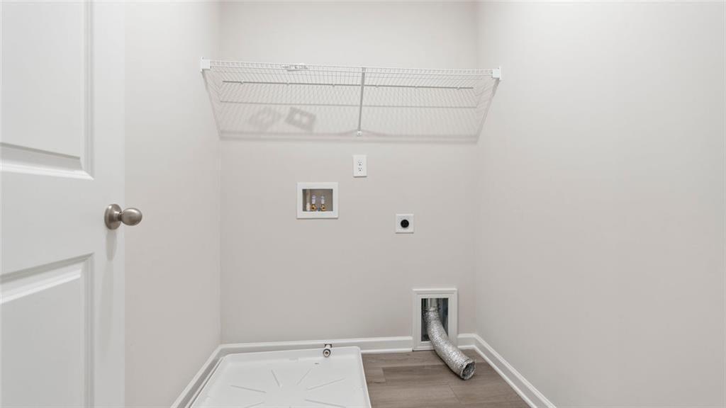 1629 Flint River Place Southeast Smyrna, GA 30126 - Photo 17 of 27 a view of a room with racks on the wall