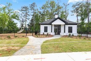 1629 Flint River Place Southeast Smyrna, GA 30126 - Photo 23 of 27 a view of a house with swimming pool and a yard