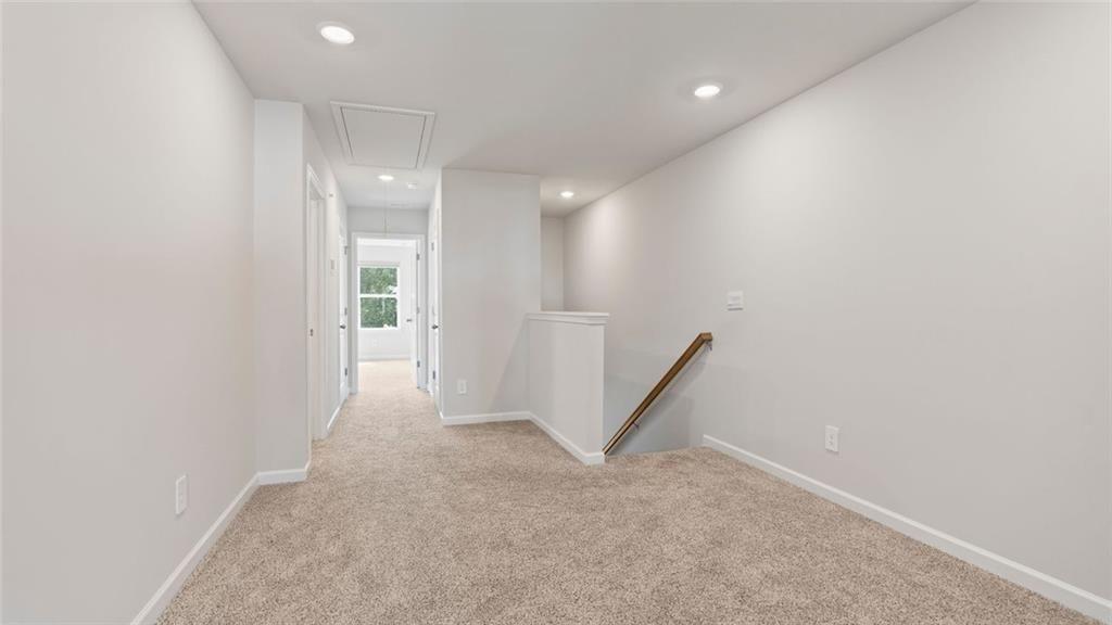 1629 Flint River Place Southeast Smyrna, GA 30126 - Photo 7 of 27 a view of a hallway with staircase