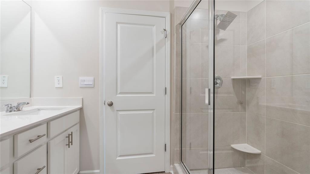 1629 Flint River Place Southeast Smyrna, GA 30126 - Photo 10 of 27 a bathroom with a shower and a sink