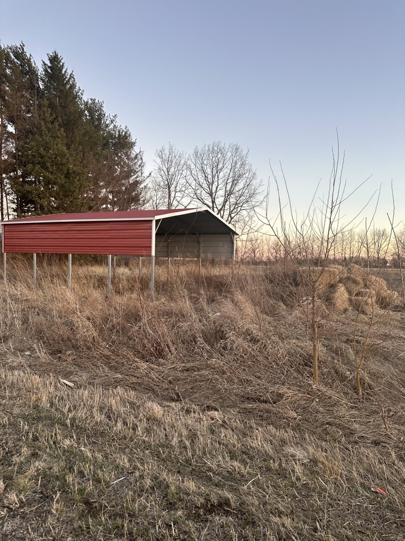 15757 Black Road Lyndon, IL 61261 - Photo 3 of 4 a view of a small yard with wooden fence