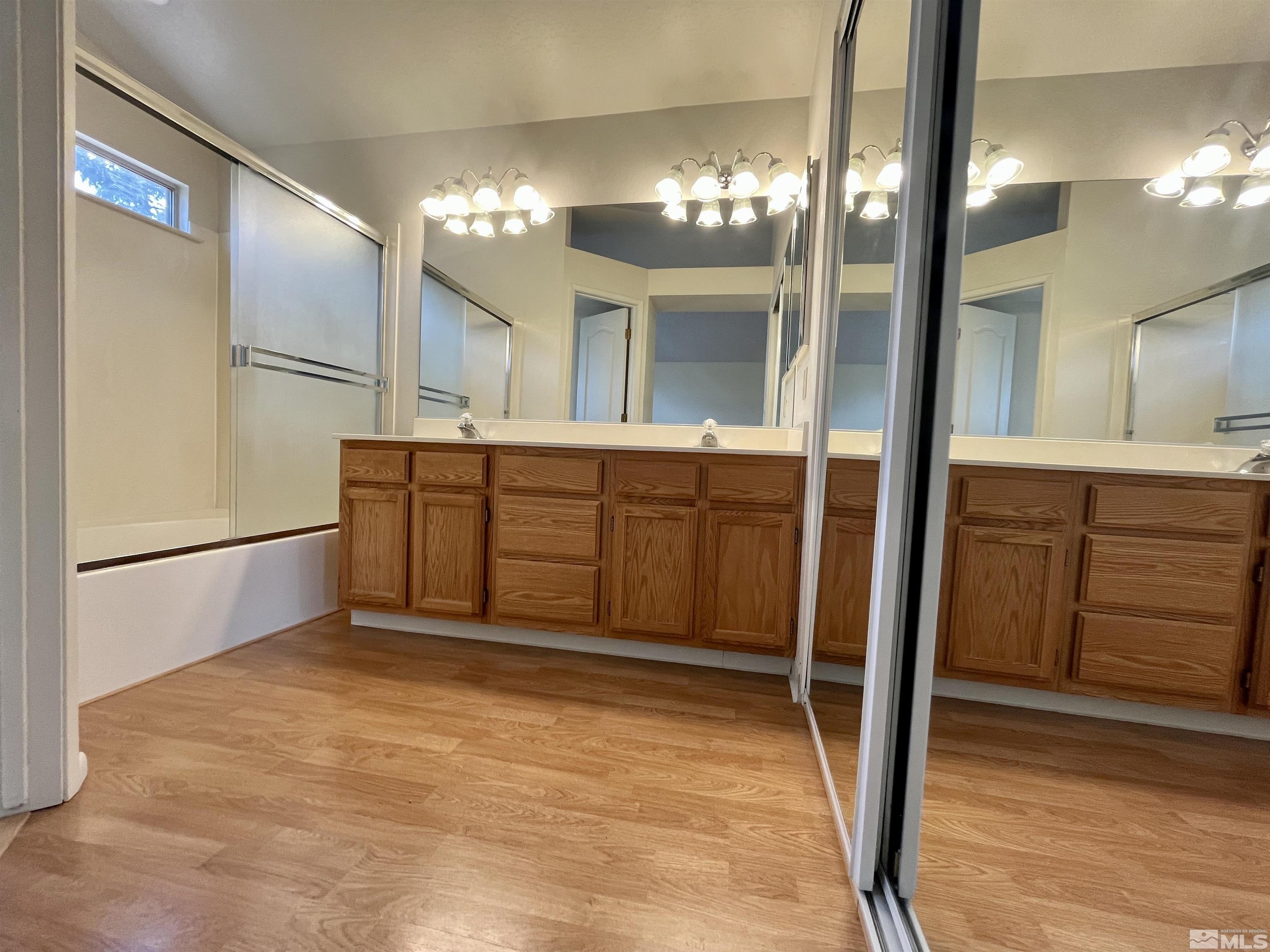 6310 Park Place Reno, NV 89523 - Photo 13 of 22 a view of a kitchen with a sink and chandelier in kitchen