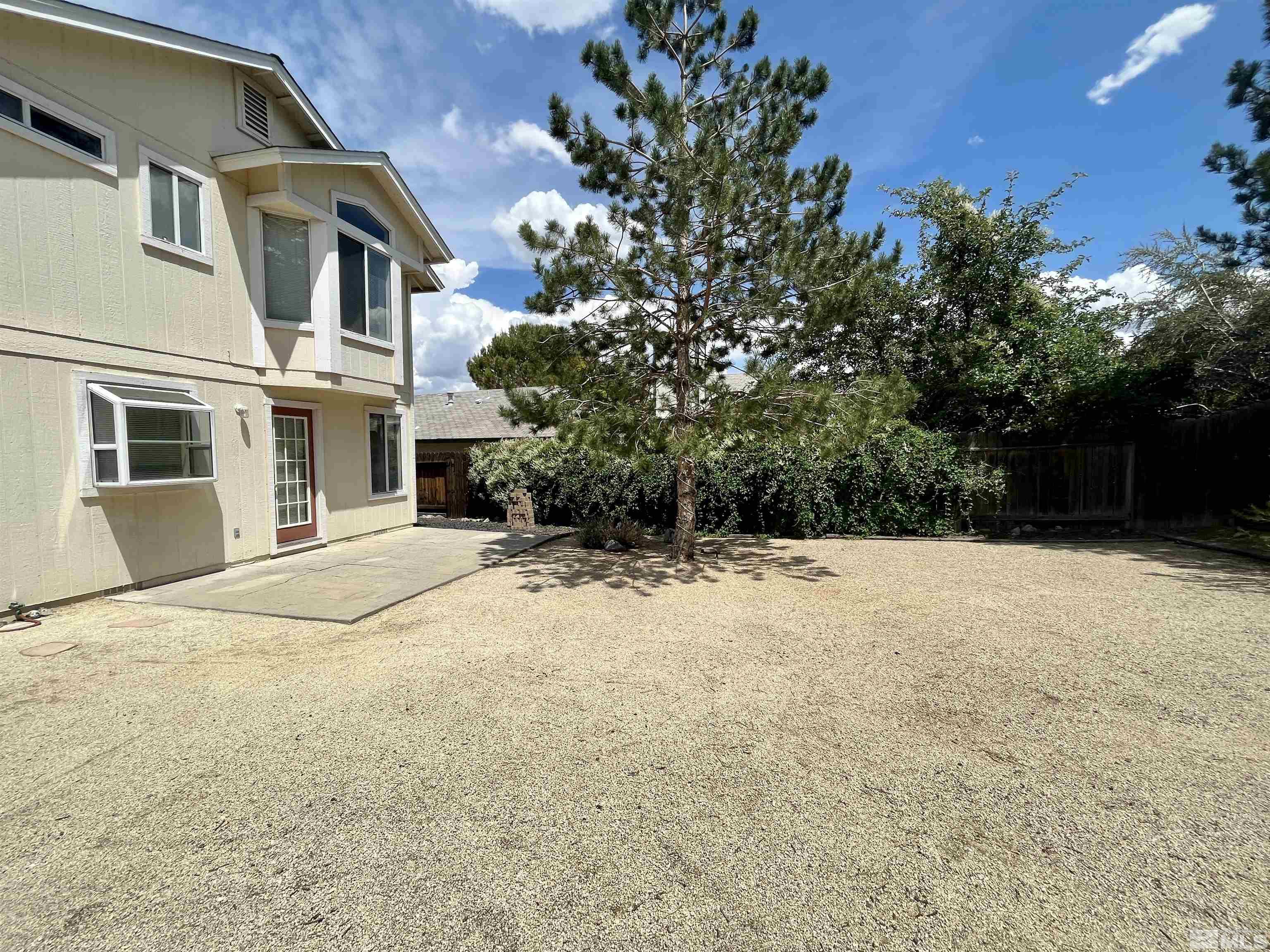 6310 Park Place Reno, NV 89523 - Photo 19 of 22 a view of a house with a yard