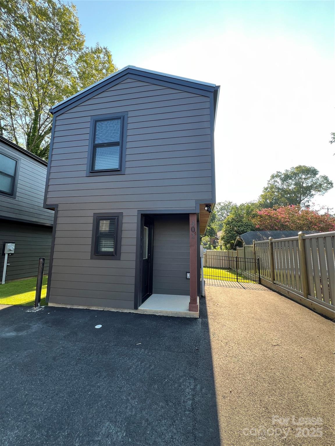402 North 4th Street Albemarle, NC 28001 - Photo 2 of 19 a view of a house with a swimming pool