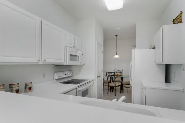 $315,000 | 3972 Bishopwood Court East, Unit 203, Naples, FL 34114
