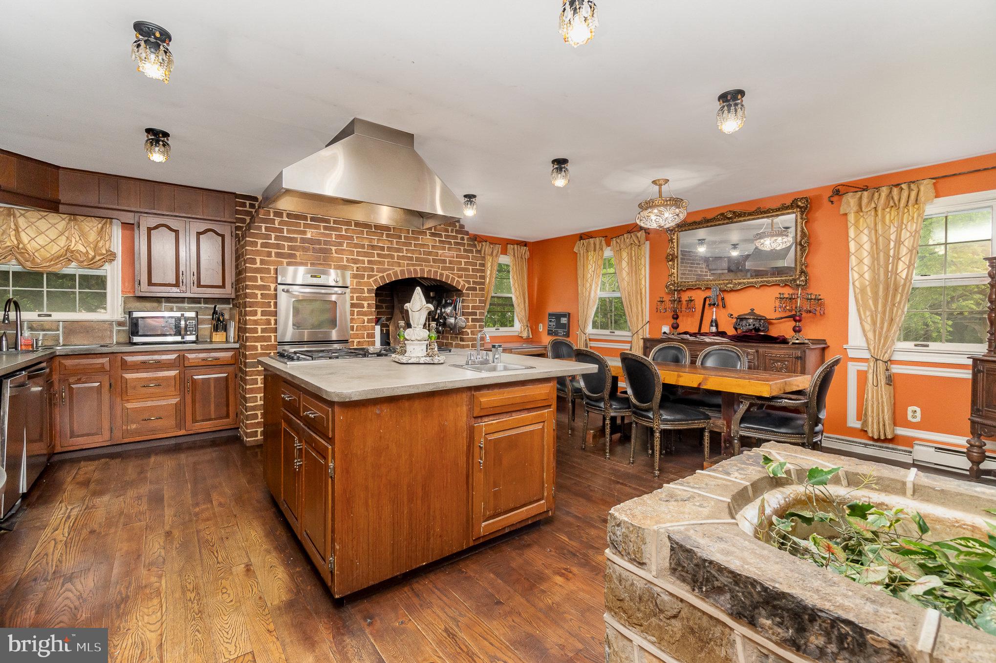 1554 Williams Grove Road Dillsburg, PA 17019 - Photo 15 of 75 a kitchen with stainless steel appliances granite countertop a stove and a sink