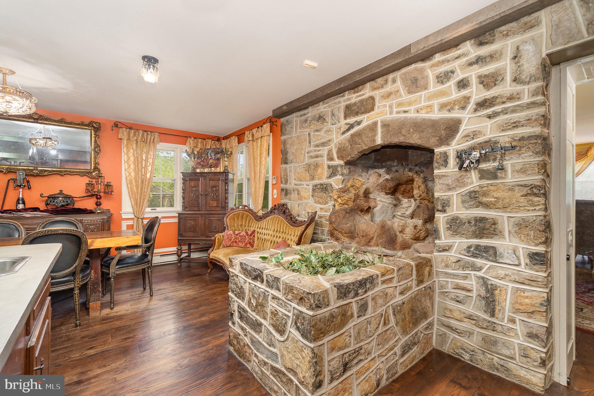 1554 Williams Grove Road Dillsburg, PA 17019 - Photo 19 of 75 a living room with fireplace furniture and a floor to ceiling window