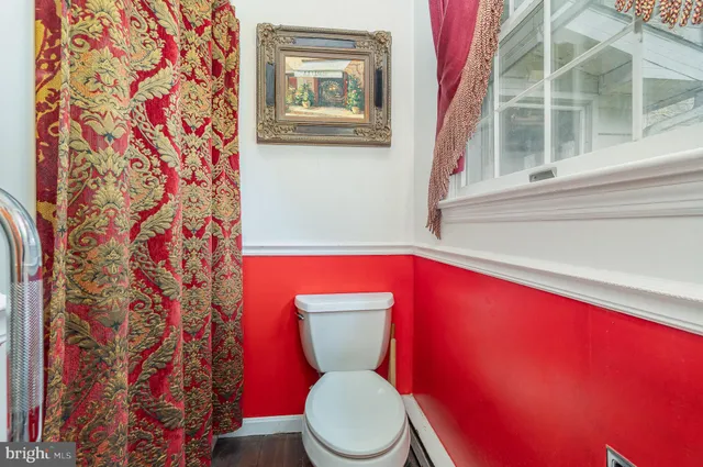 a room with a sink and a window