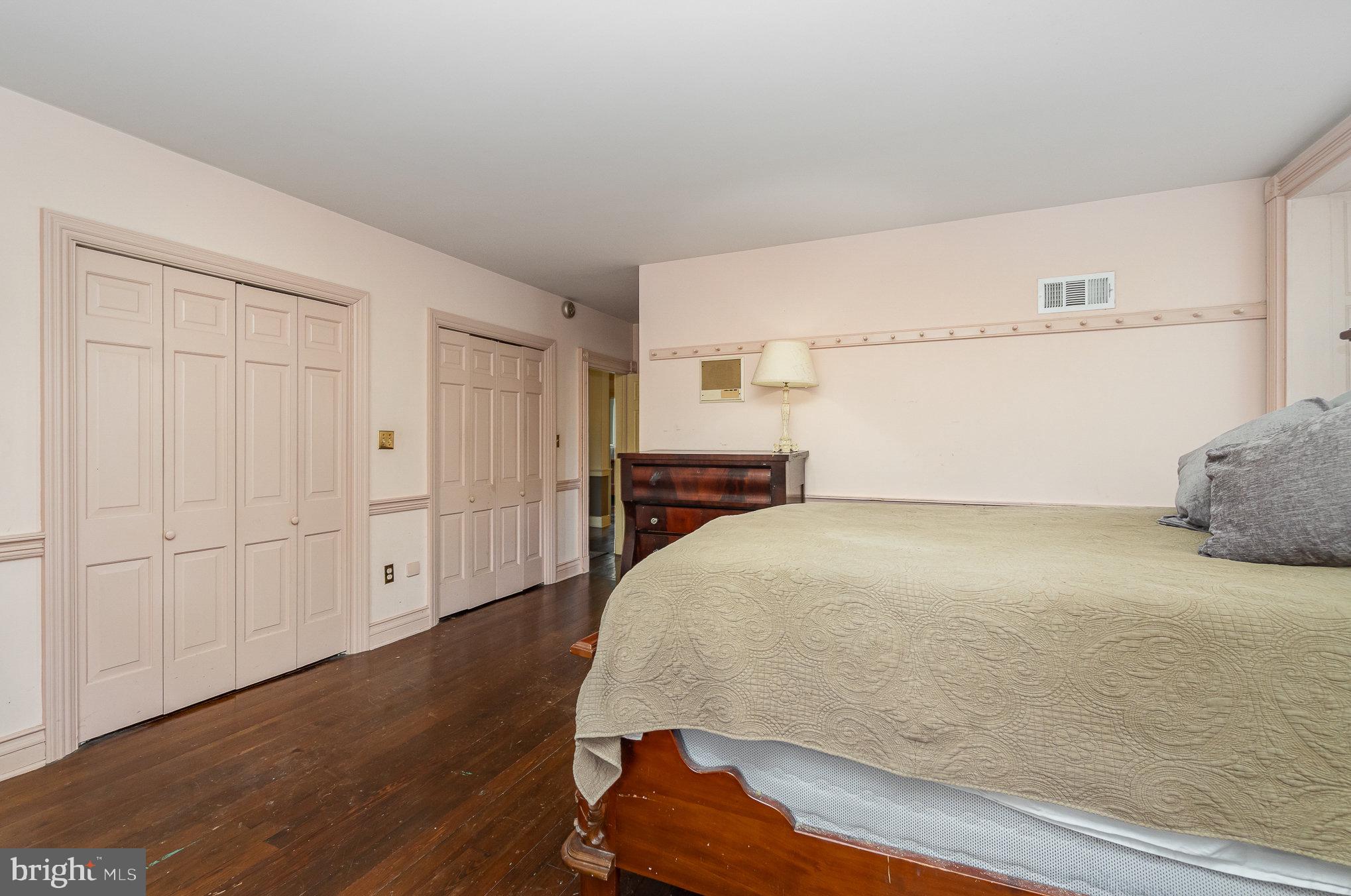 1554 Williams Grove Road Dillsburg, PA 17019 - Photo 28 of 75 a bedroom with a bed and cabinets