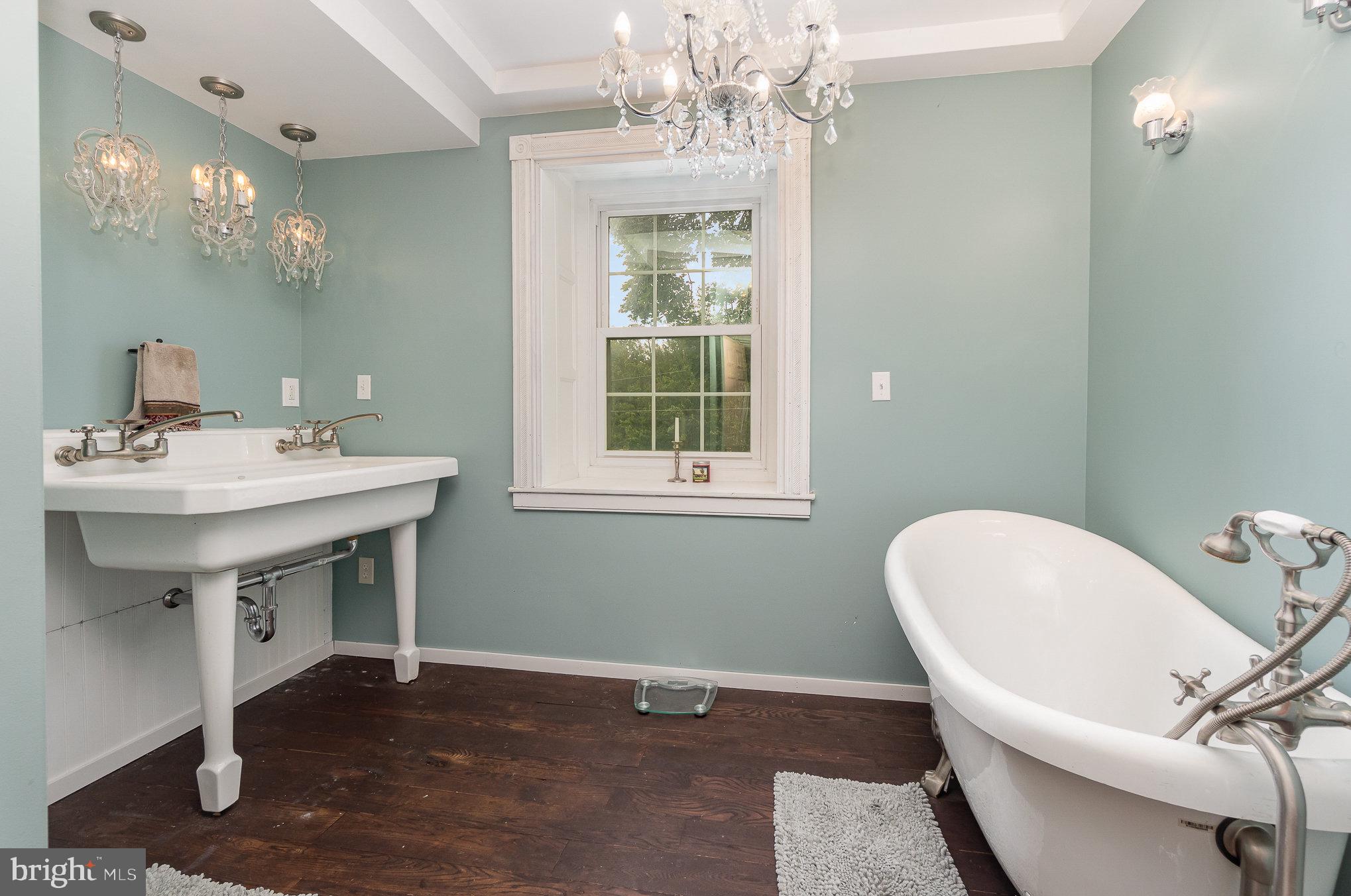 1554 Williams Grove Road Dillsburg, PA 17019 - Photo 29 of 75 a bathroom with a sink a toilet and a mirror