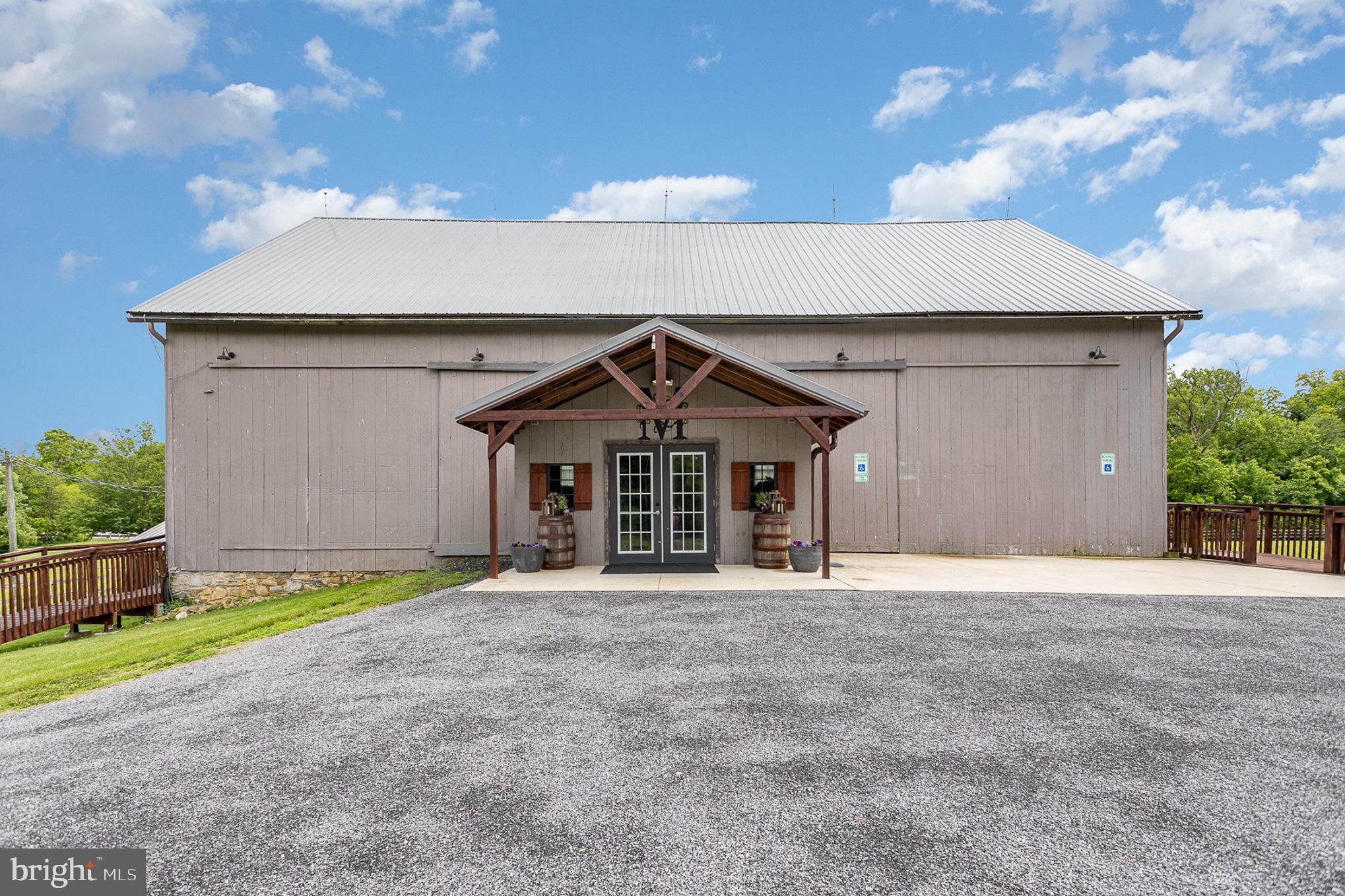 1554 Williams Grove Road Dillsburg, PA 17019 - Photo 3 of 75 a front view of a house with a yard and garage