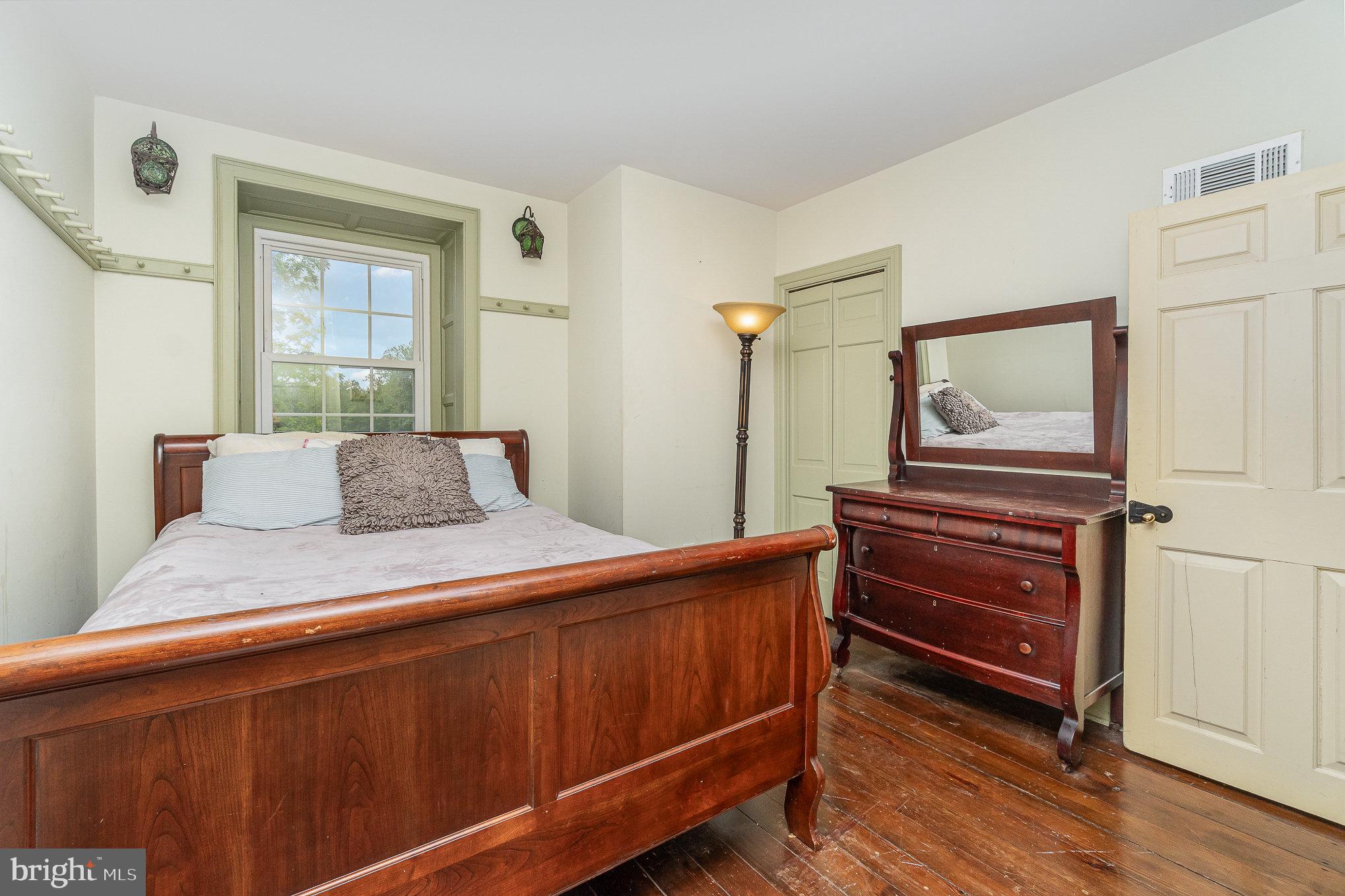 1554 Williams Grove Road Dillsburg, PA 17019 - Photo 32 of 75 a bedroom with a bed and a dresser