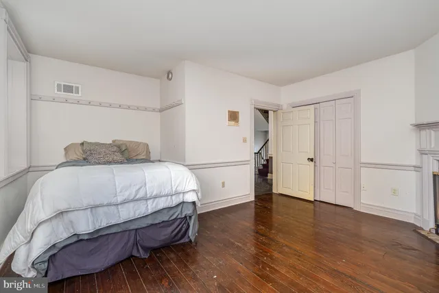 a picture of a bathroom with a shower