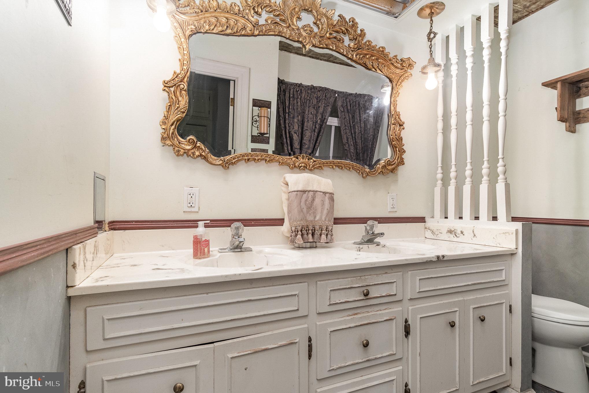1554 Williams Grove Road Dillsburg, PA 17019 - Photo 37 of 75 a bathroom with a sink and a mirror